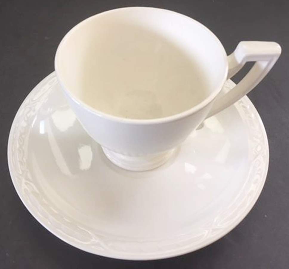 PGO12 Footed Cup & Saucer Set by Petrus Regout & Co-1