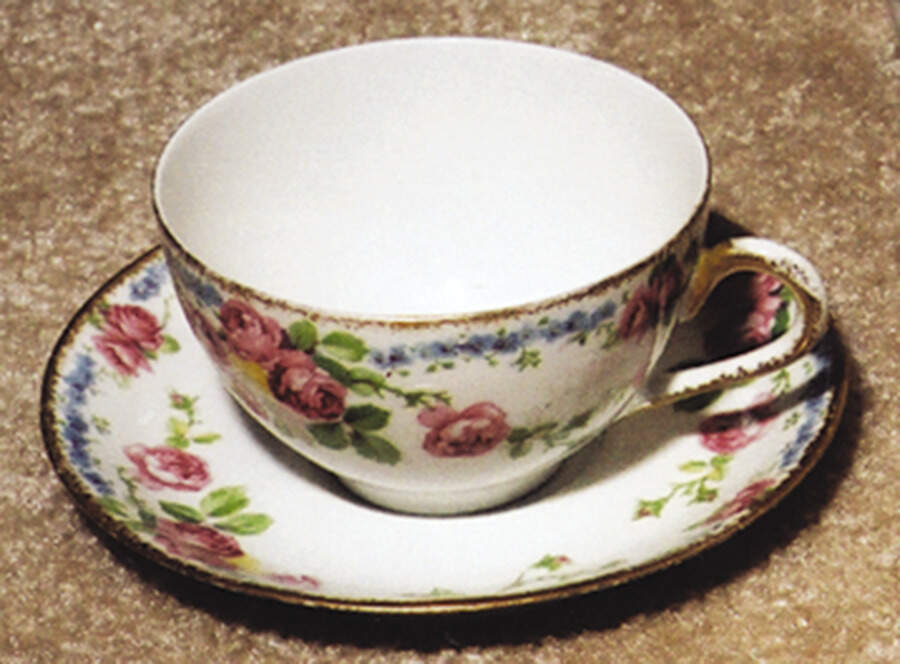 POY285 Flat Cup & Saucer Set by Jean Pouyat-1