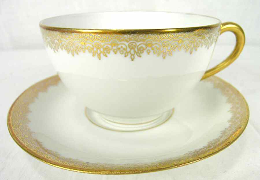 POY631 Footed Cup & Saucer Set by Jean Pouyat-1