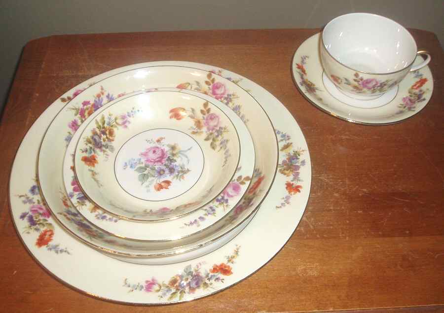 POY633 Flat Cup & Saucer Set by Jean Pouyat-1