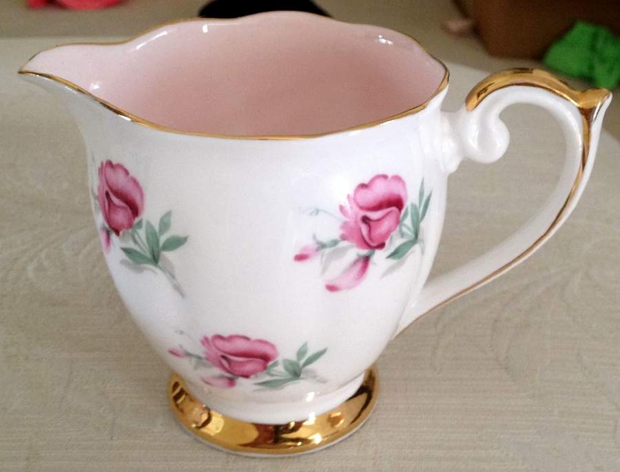 QUA74 Creamer by Queen Anne (England)-1