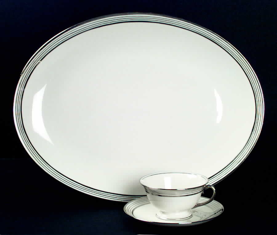 Romance Footed Cup & Saucer Set by Ransgil-1