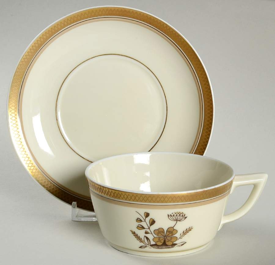 Golden Clover (White) Flat Cup & Saucer Set by Royal Copenhagen-1