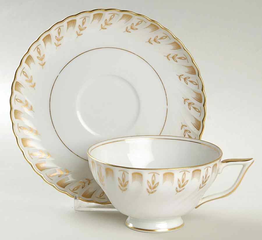 Heirloom Footed Cup & Saucer Set by Royal Tettau-1