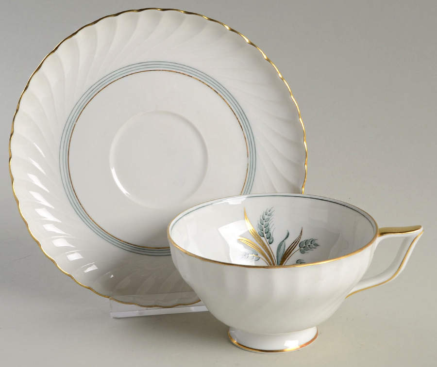 ROT22 Footed Cup & Saucer Set by Royal Tettau-1