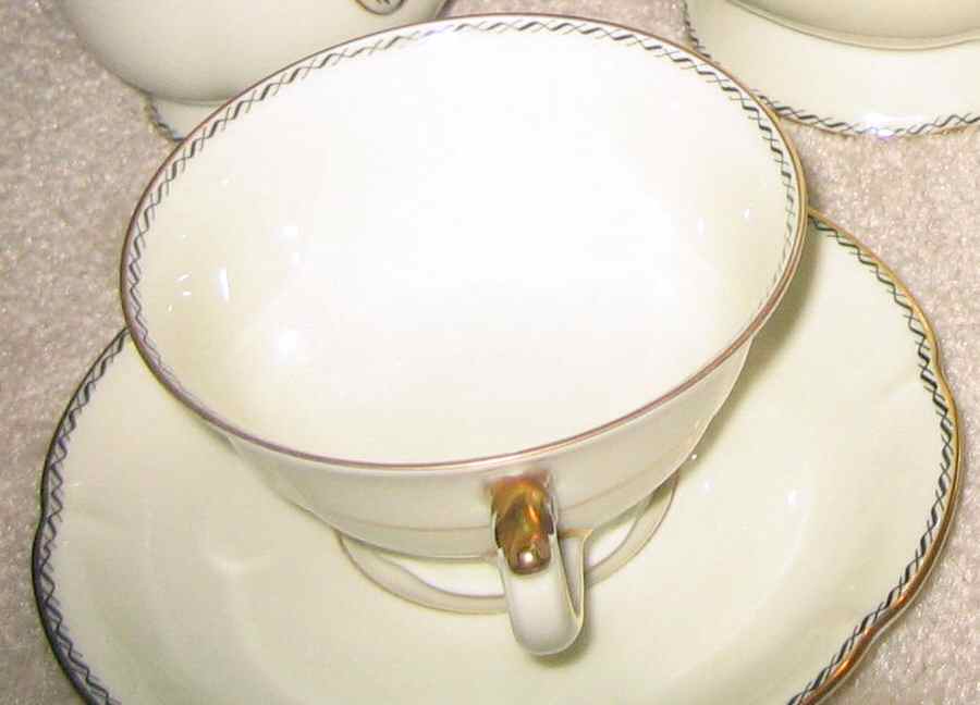 ROT280 Footed Cup & Saucer Set by Royal Tettau-1