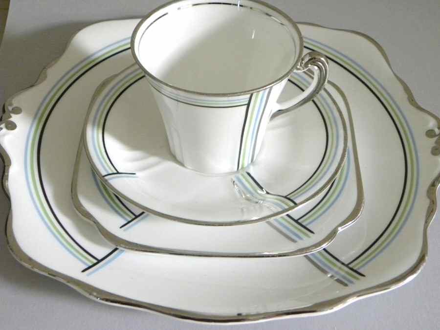 5817 Flat Cup & Saucer Set by Roslyn (England)-1