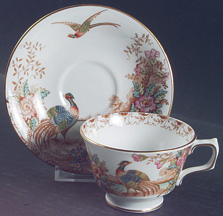 Exotic Footed Cup & Saucer Set by Sutherland-1