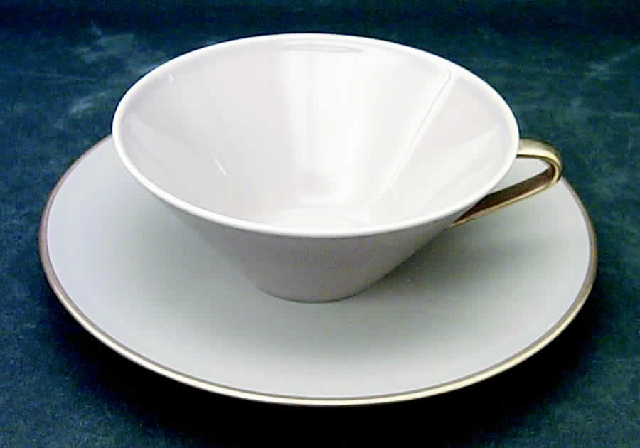 Gilt Flat Cup & Saucer Set by Swid Powell-1