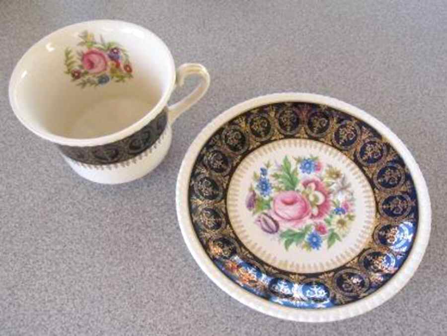 SIM21 Flat Cup & Saucer Set by Simpsons-1