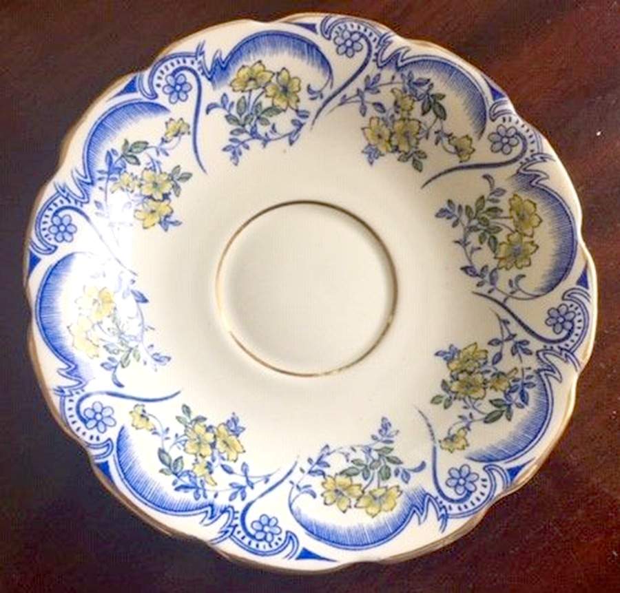 Regina (Yellow Flowers) Saucer by Spencer Stevenson -1