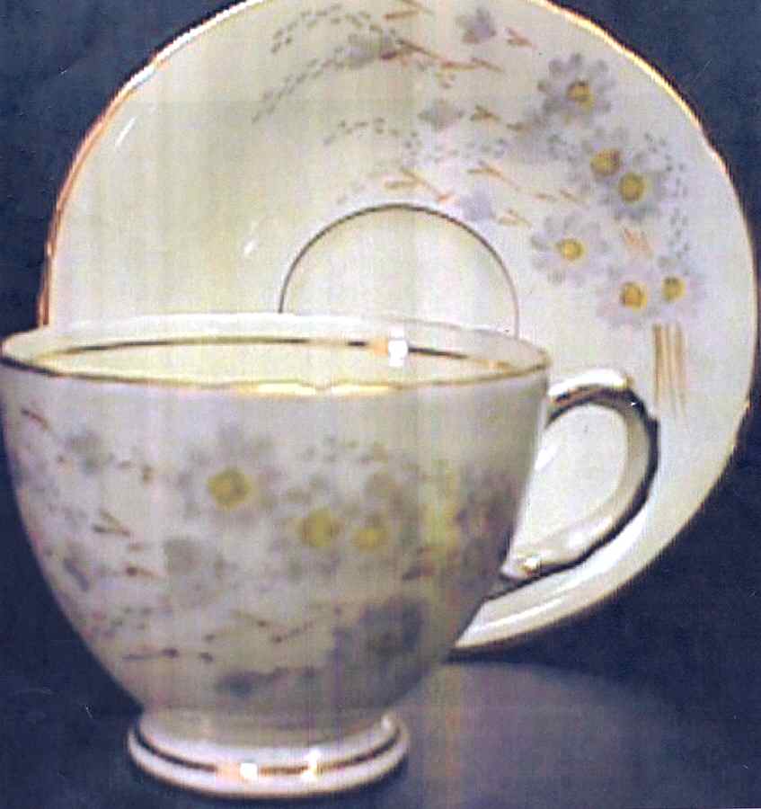 2675 Footed Cup & Saucer Set by Sutherland-1