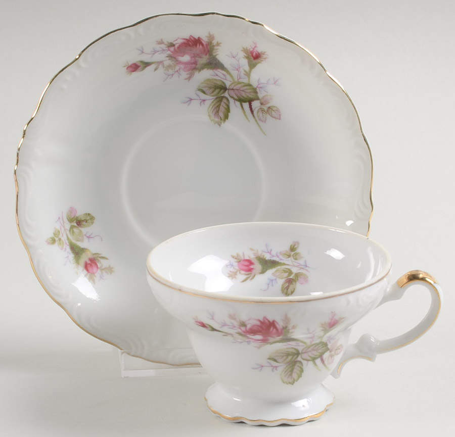 Old Rose Footed Cup & Saucer Set by Ucagco-1