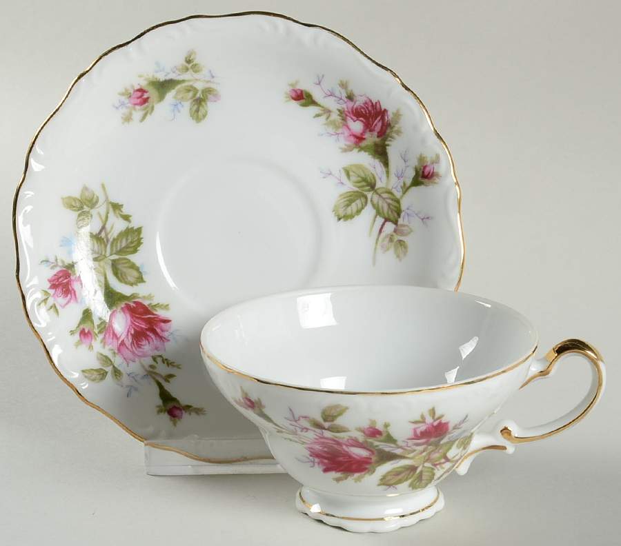 Old Rose Footed Cup & Saucer Set by Ucagco-1