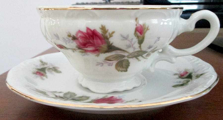 Old Rose Footed Cup & Saucer Set by Ucagco-1
