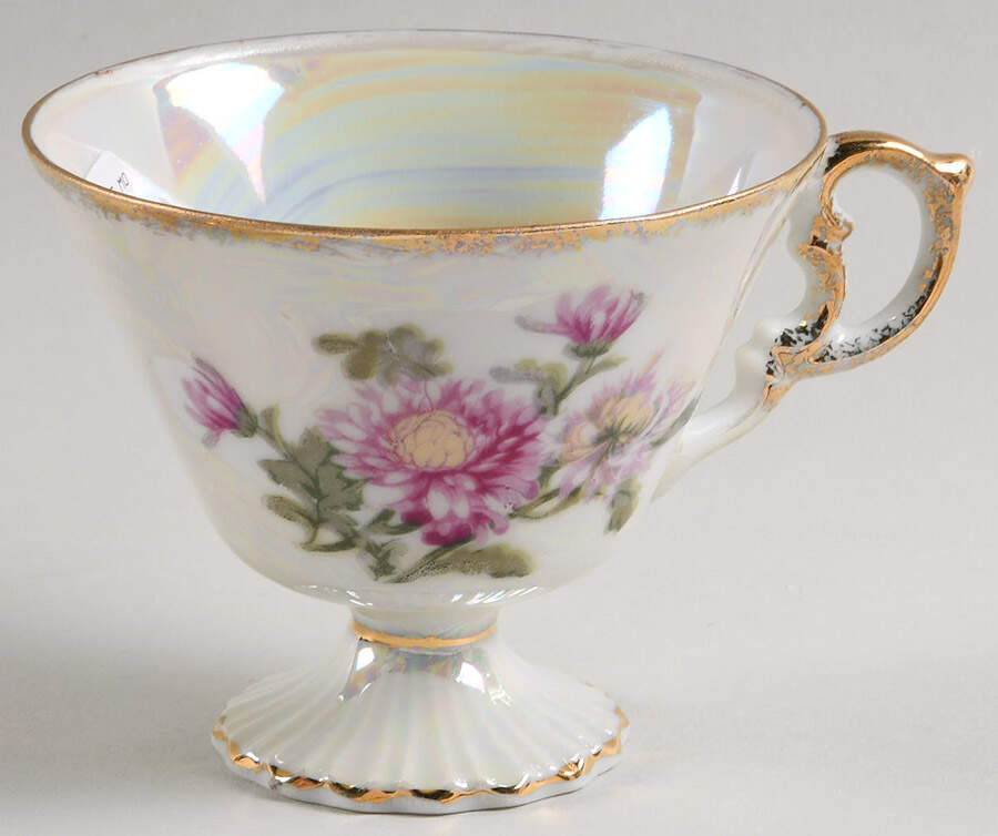Flower of the Month Footed Cup by Ucagco-1
