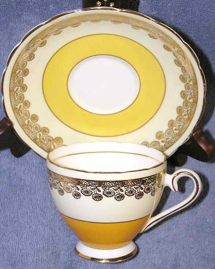 108-4 Footed Cup & Saucer Set by Wellington (England)-1