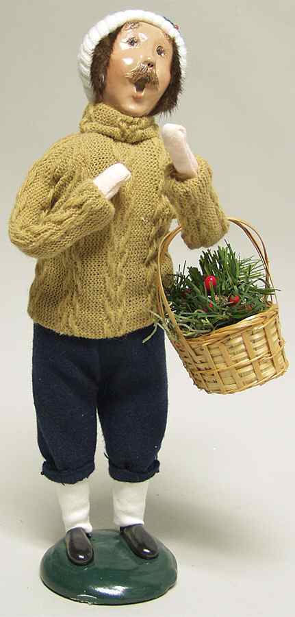 Traditional Assorted Carolers Man With Basket Of Greenery-Yellow Sweat - No Box by Byers' Choice Ltd-1