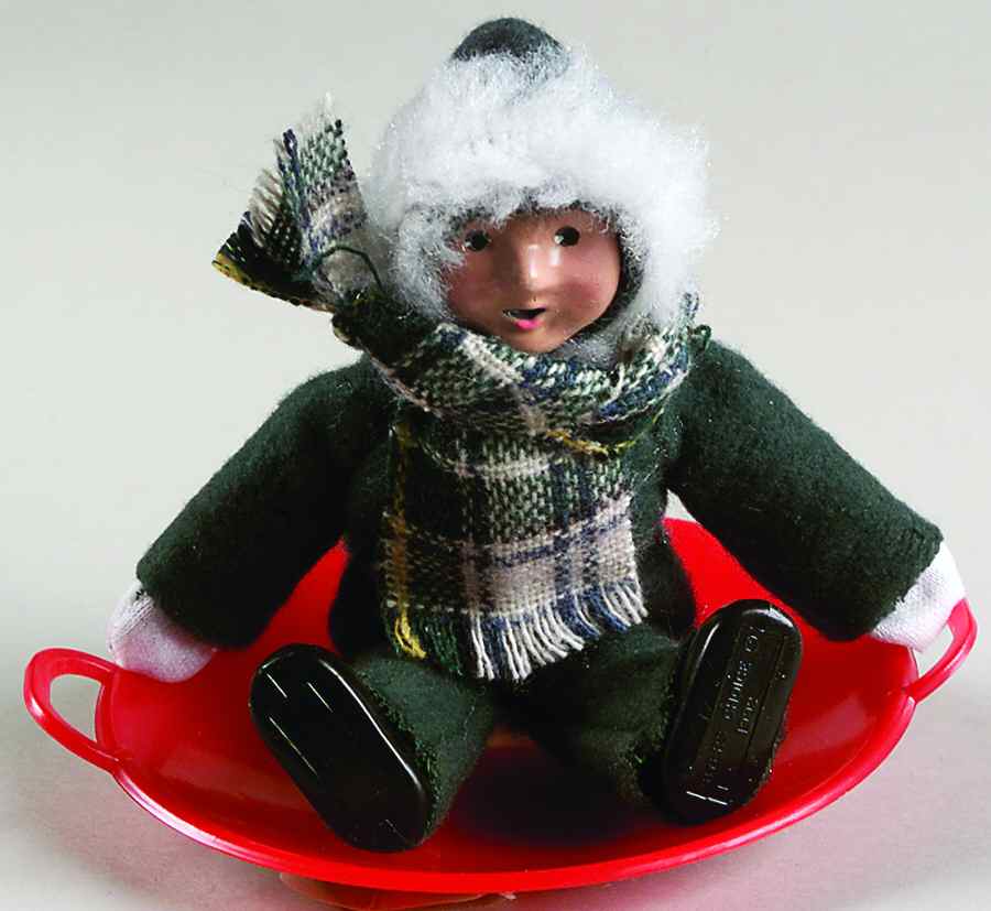 Winter Outdoor Activities Toddler On Snowsaucer-Green - No Box by Byers' Choice Ltd-1