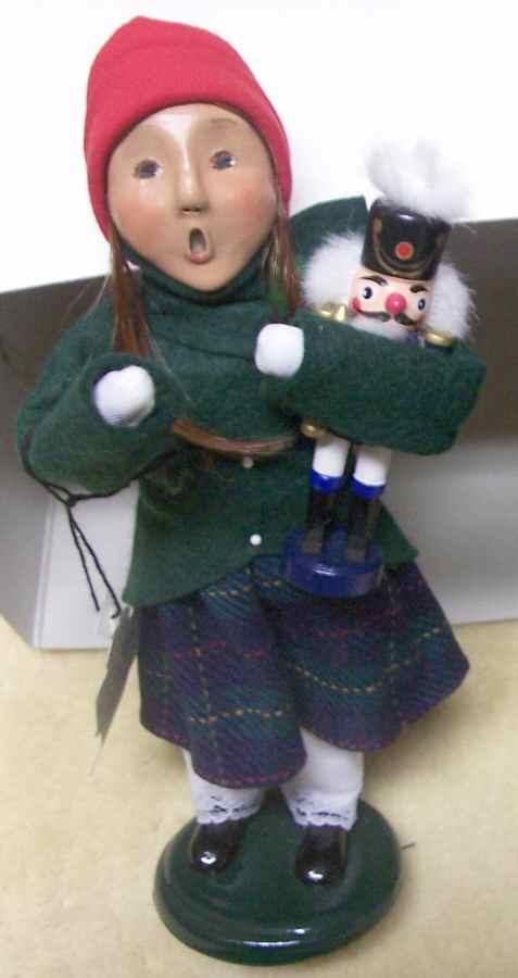 Traditional Assorted Carolers Girl With Nutcracker-Red Hat  - Nb654, No Box by Byers' Choice Ltd-1