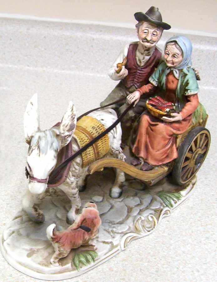 Capodimonte Giftware Older Couple On Wagon - No Box by Capodimonte-1