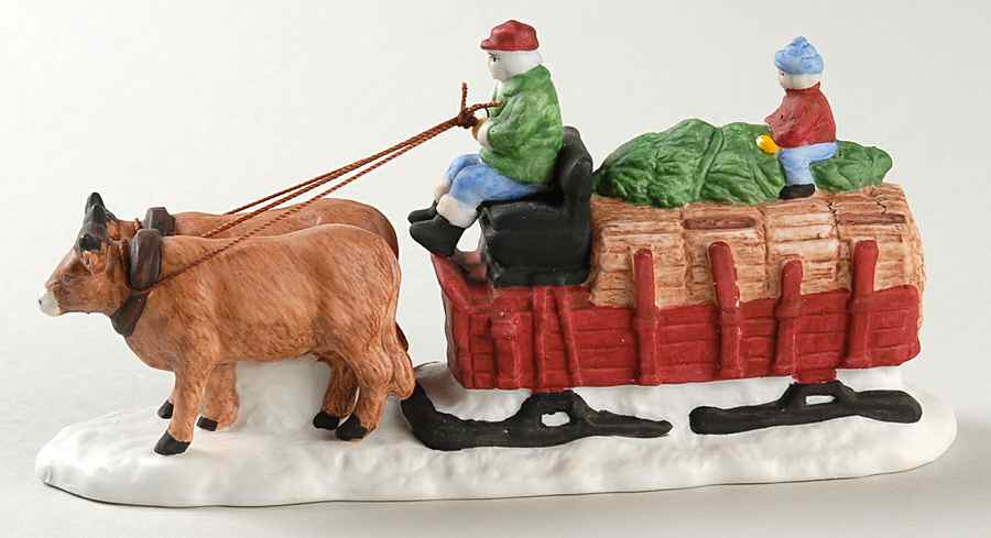 Dickens Village Ox Sled-Blue Pants-Snow  Attached To Ox - Boxed by Department 56-1