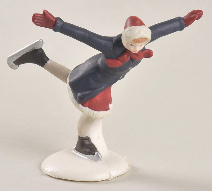 New England Village Girl Skating Only - No Box 40b by Department 56-1