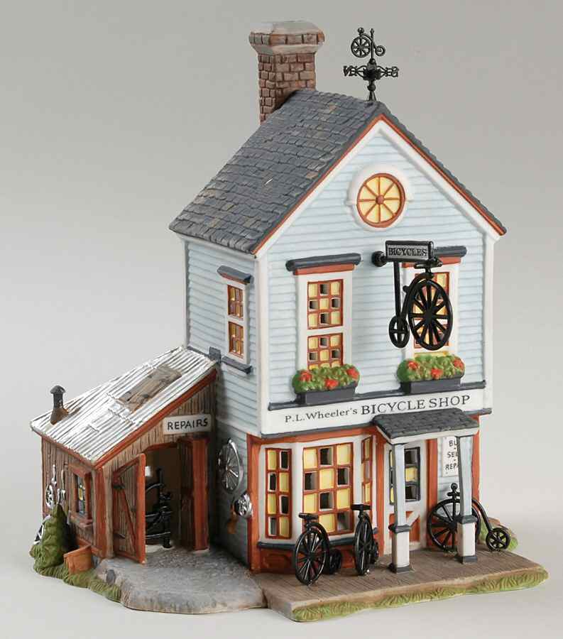 New England Village P.L.Wheeler's Bicycle Shop - Boxed by Department 56-1