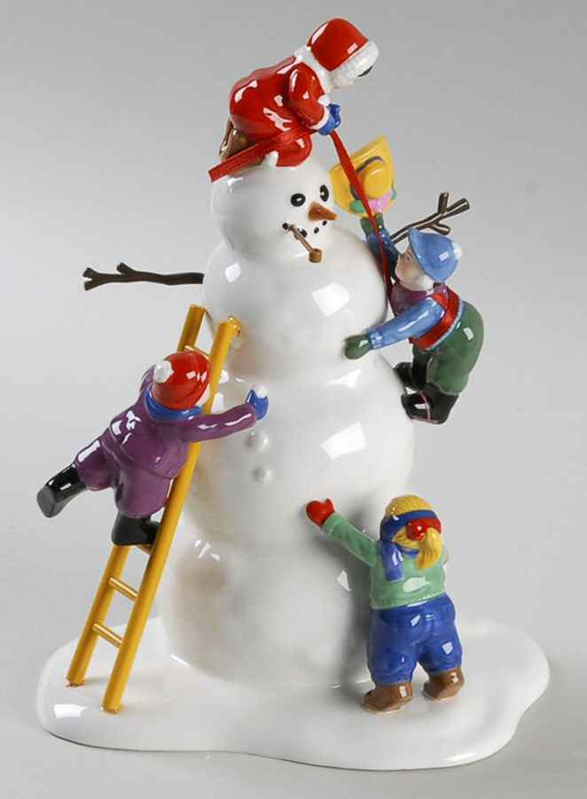 Snow Village Mainstreet Snowman - Boxed by Department 56-1