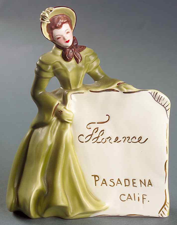 Advertising Signs Lady In Green Dress Holding Banner - Advertising Signs by Florence Ceramics-1