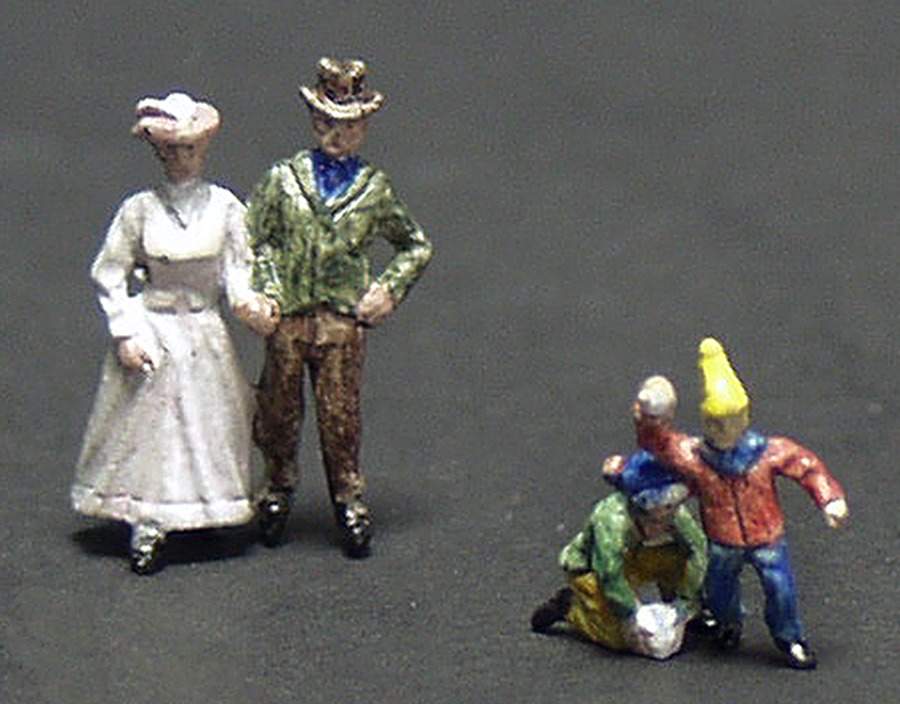 Alpine Christmas Village Skating Couple And Children - Boxed by John Hine Studios-1