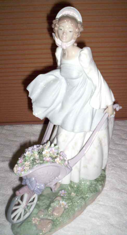 Women Working Girl Wheeling Flowers - No Box by Lladro-1