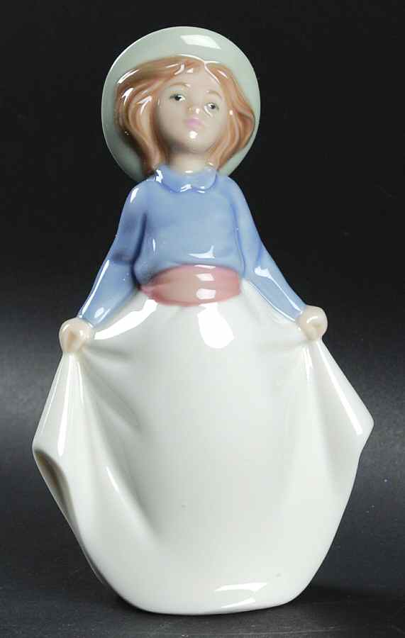 Girls Girl Picking Up Her Skirt - With Box by Nao-1