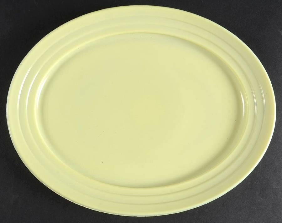 Moderntone Platonite Pastel Yellow 12" Oval Platter by Hazel-Atlas-1