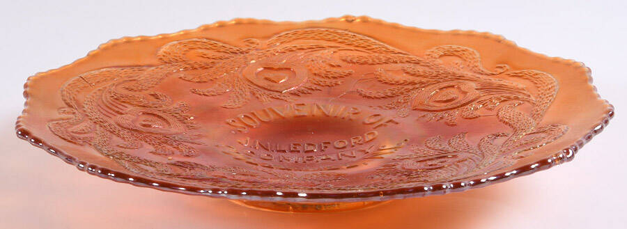 Heart and Vine-Golden (Marigold) Footed Cake Plate with Advertising by Fenton-1