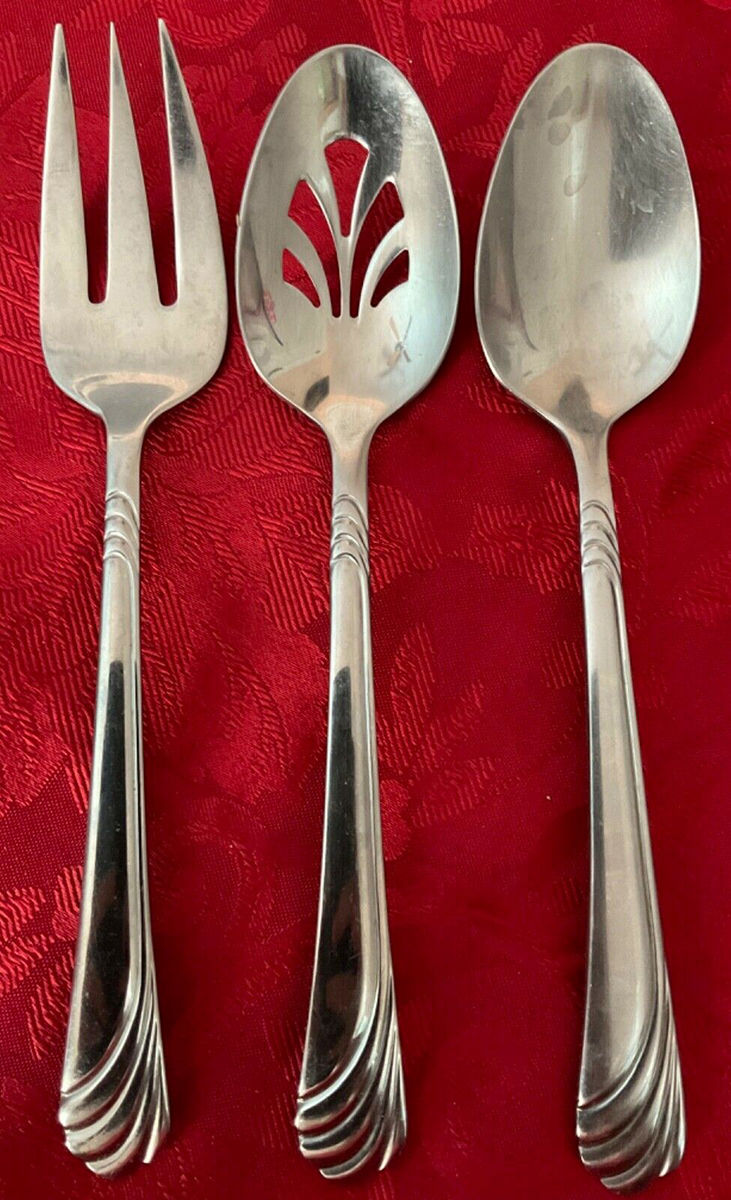 Christine (Stainless) Pierced Tablespoon (Serving Spoon) by Oneida Silver-1