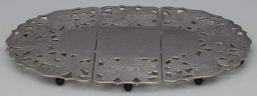 Silverplate Hollowware Expandable Trivet by Raimond-1