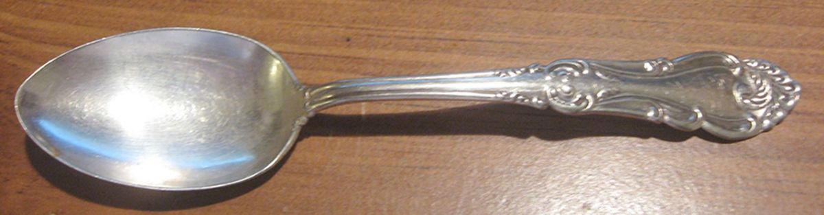 Four (Silverplate) Teaspoon by Wm H Rogers-1