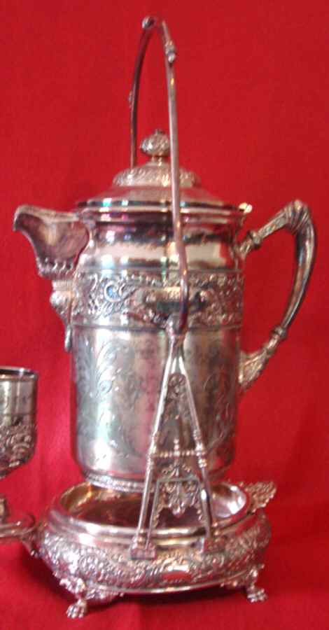 WIV1 (Silverplate, Hollowware) Pitcher with Hinged Lid and Tilting Stand by Wilcox Silverplate-1