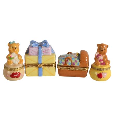 Four Porcelain Baby Trinket Boxes
