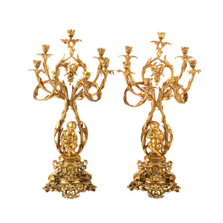 Pair of French Gilt Bronze Cherub 7-Light Candelabras