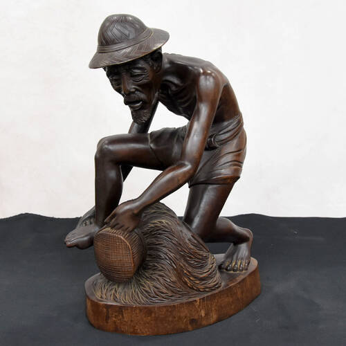 Hancock Wooden Figure of a Fisherman from Bali