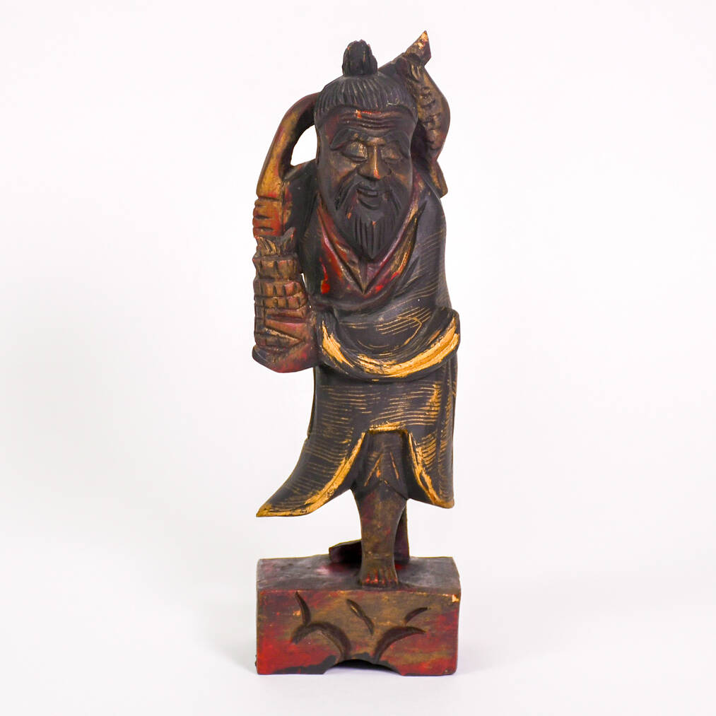 Wooden Carved Man with Catch of the Day Figure