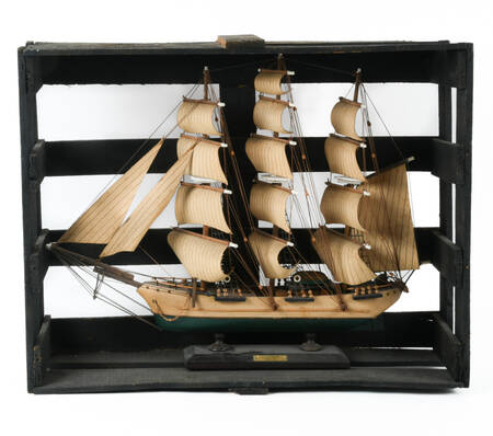 Model Ship in Crate Statue