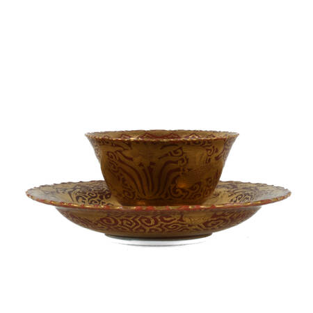 Japanese Coral Ground Gilt Cup and Saucer Set