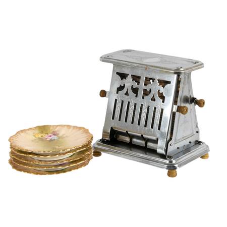 Universal Toaster and Five Limoges Bread and Butter Plates