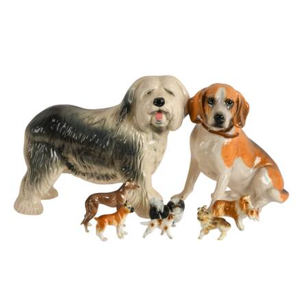 Charming Set of Eight Diverse Miniature Ceramic Dogs