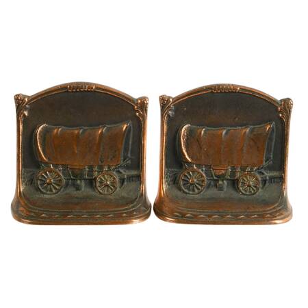 W. H. Howell Co. Cast Iron "Tracking West" Bookends