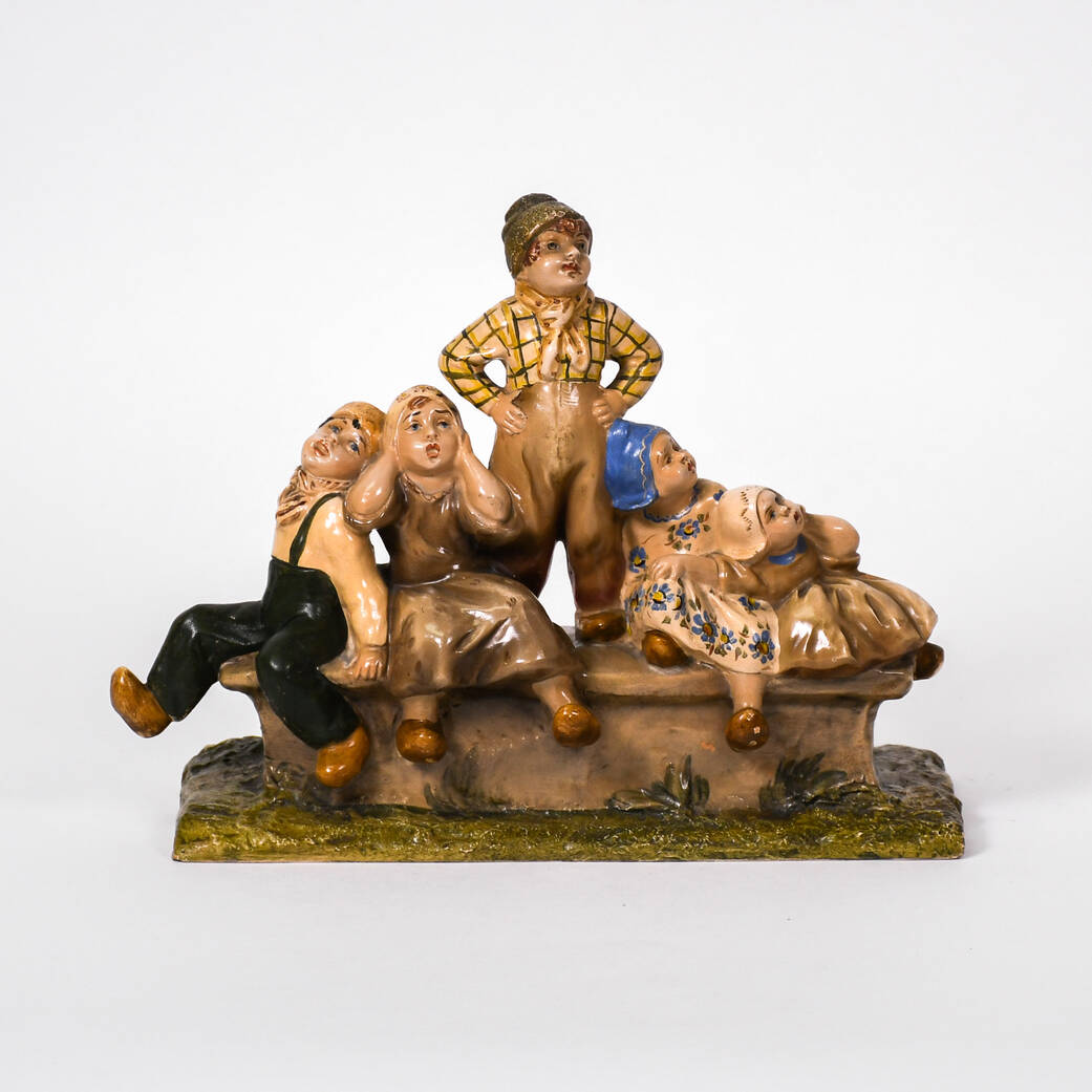 5 Dutch Children on a Bench Terracotta Glazed Figurine