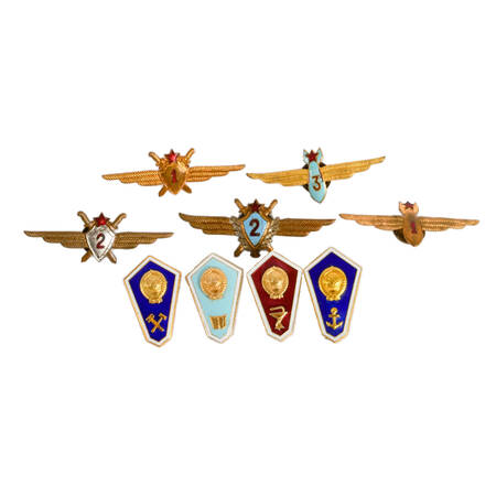 Nine Soviet Union Brass and Enamel Navigator, Wings, and College Badges